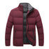 wine red puffer jacket with black detailing displayed on a white background, jacket has two zip pockets in front.