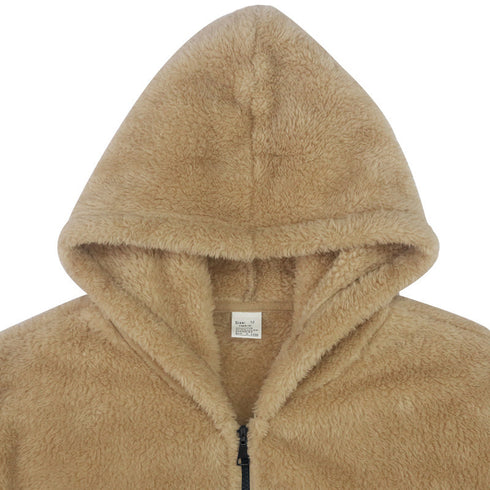 closeup view of hood of men's winter fur double-sided jacket, tag can be seen