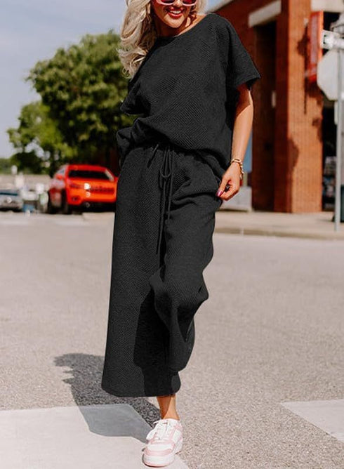 Black Jumpsuit, short sleeves, wide trouser with string closure