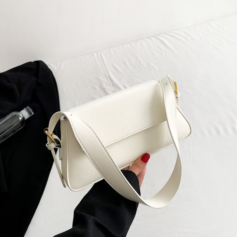 white messenger bag with adjustable strap