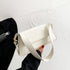 white messenger bag with adjustable strap