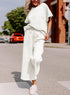 White Jumpsuit, short sleeves, wide trouser with string closure