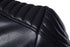 closeup view of shoulders of black leather jacket, pleated and puffy